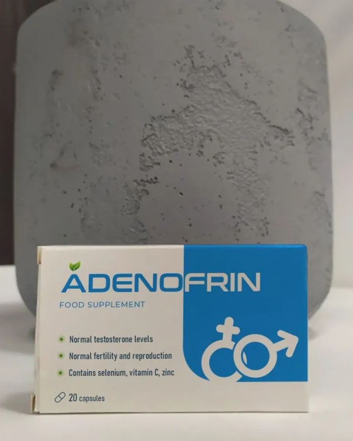 Confezione di Adenofrin accanto a un vaso di piante